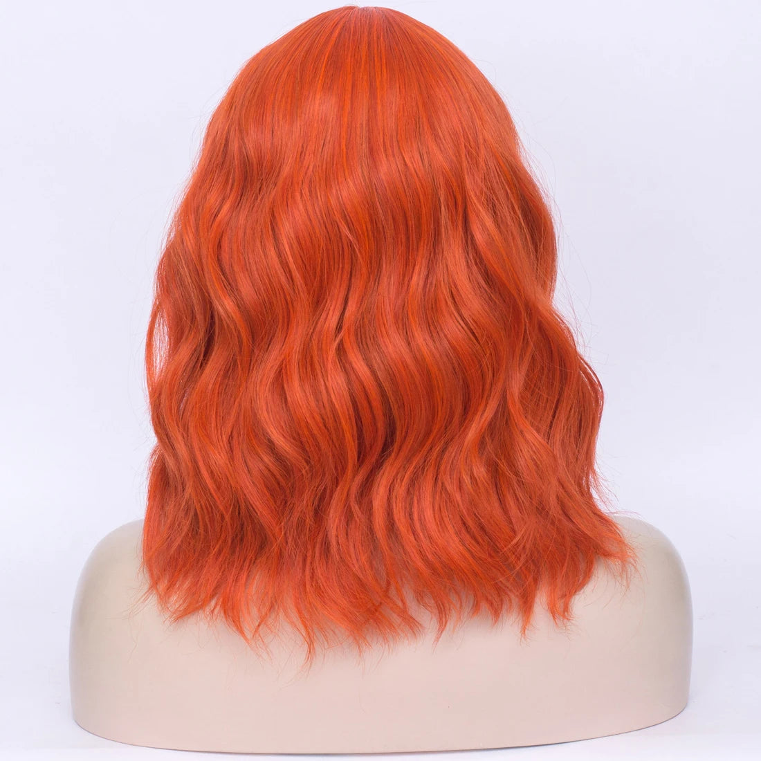 Vibrant Short Wavy Orange Wig with Bangs - Drag Queen Essential